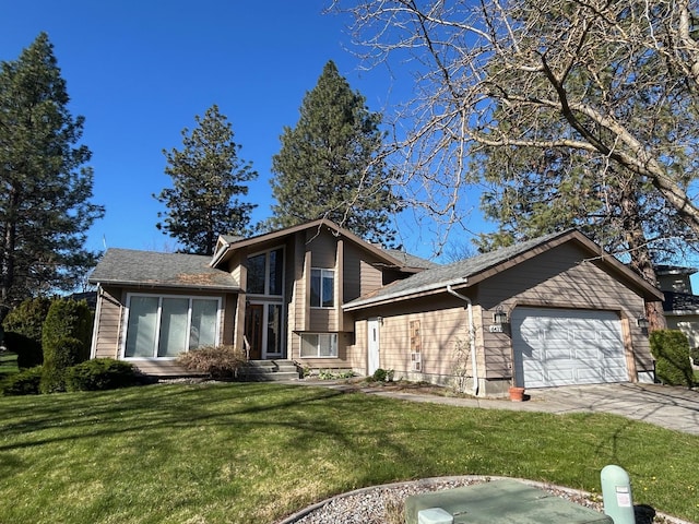6427 N Royal Crescent Ln, Spokane, WA 99205 - tri-level home with an attached garage, a front lawn, and driveway