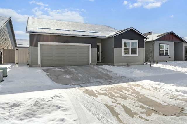 single story home with a garage