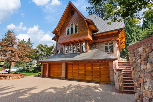 view of front of home with a garage