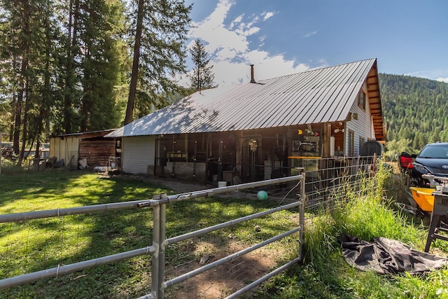 exterior space with an outbuilding