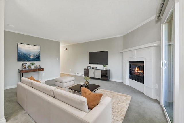 living room with crown molding, a baseboard heating unit, and light colored carpet