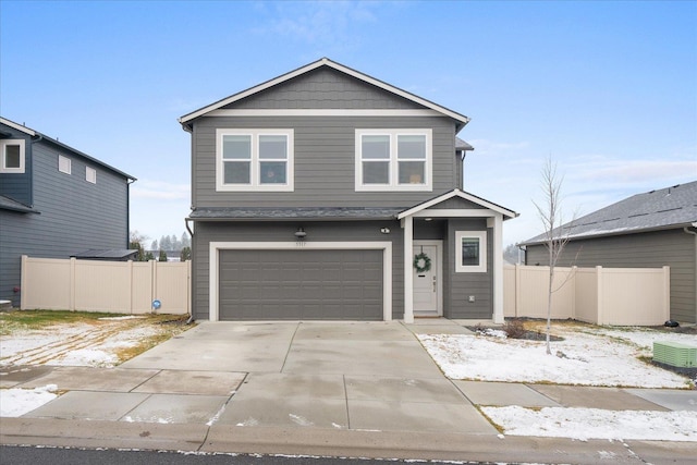 front of property with a garage