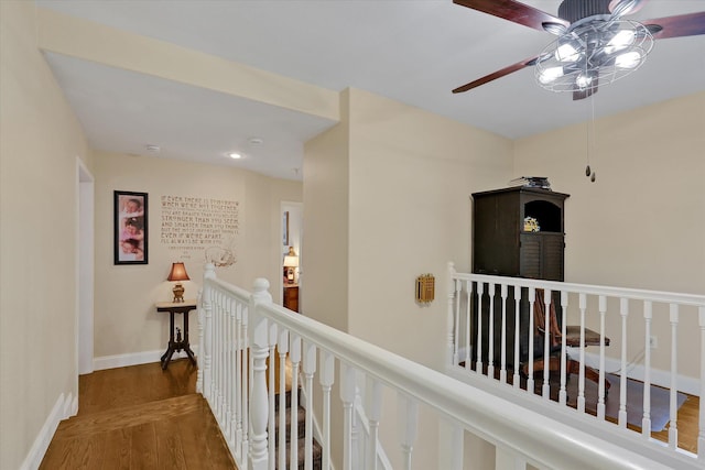 hall with dark wood-type flooring