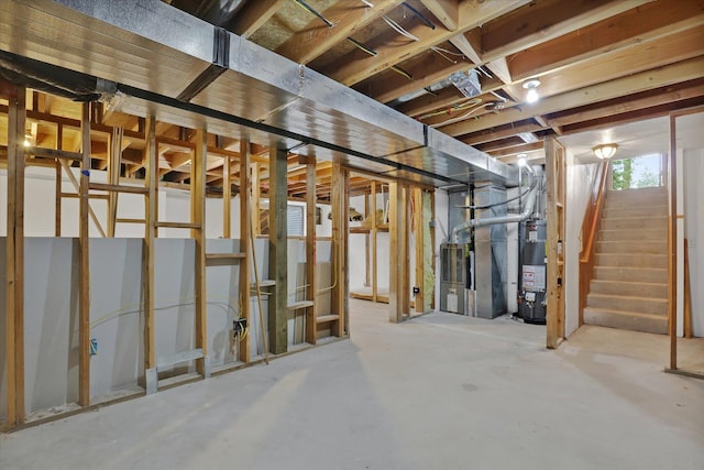 basement with heating unit and water heater