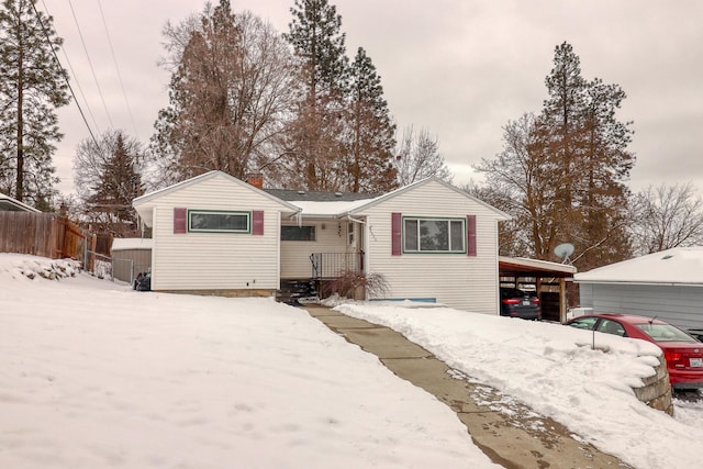 view of front of house featuring a carport