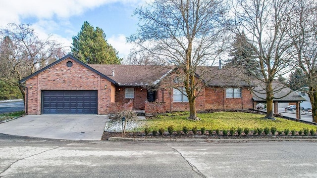 ranch-style home with a garage and a front yard