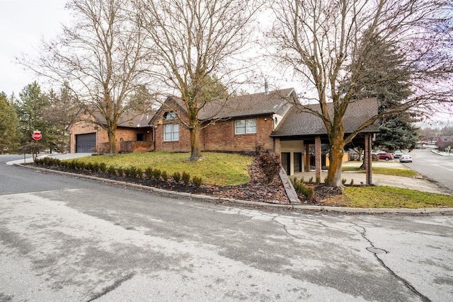 single story home featuring a garage