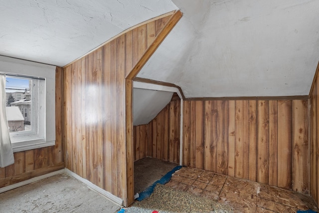 bonus room with wooden walls