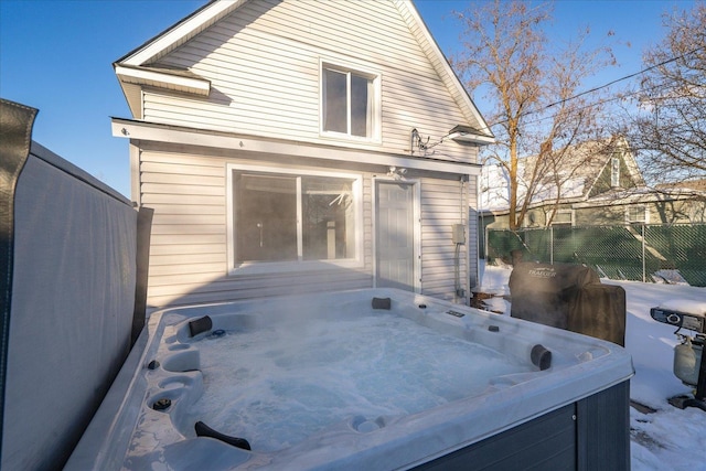 exterior space featuring a hot tub