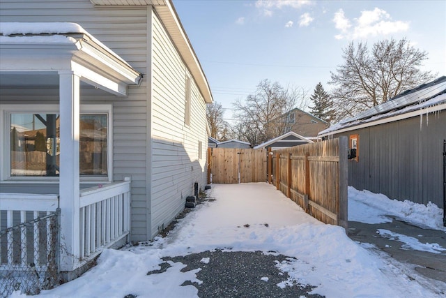 view of yard layered in snow