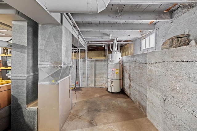 basement featuring strapped water heater