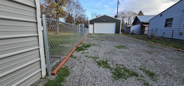 view of yard with an outbuilding and a garage