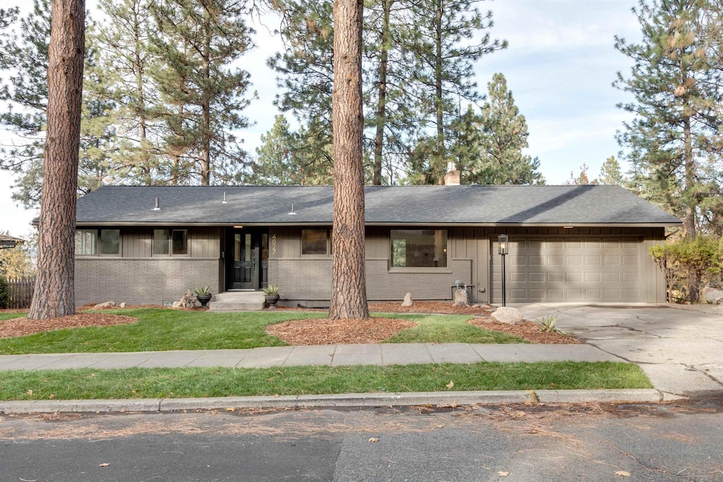 ranch-style home with a garage