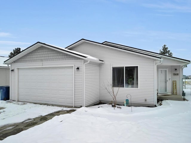 single story home featuring a garage