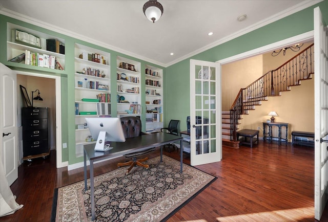 office area featuring ornamental molding, french doors, dark hardwood / wood-style flooring, and built in features