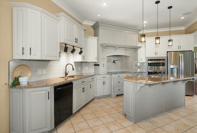 kitchen with sink, an island with sink, white cabinetry, and black appliances