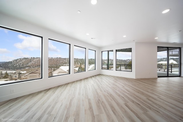 5022 S Lincoln Way, Spokane, WA 99224 - spare room with recessed lighting, wood finished floors, and baseboards