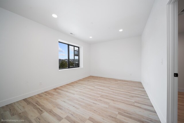 5022 S Lincoln Way, Spokane, WA 99224 - unfurnished room with wood finished floors, recessed lighting, and baseboards