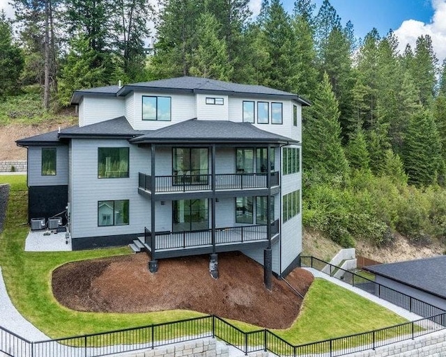 5022 S Lincoln Way, Spokane, WA 99224 - back of property featuring a balcony, a patio area, and cooling unit