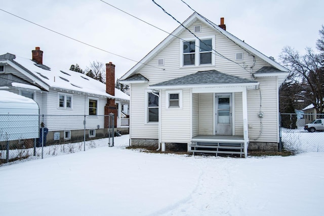 view of snow covered property