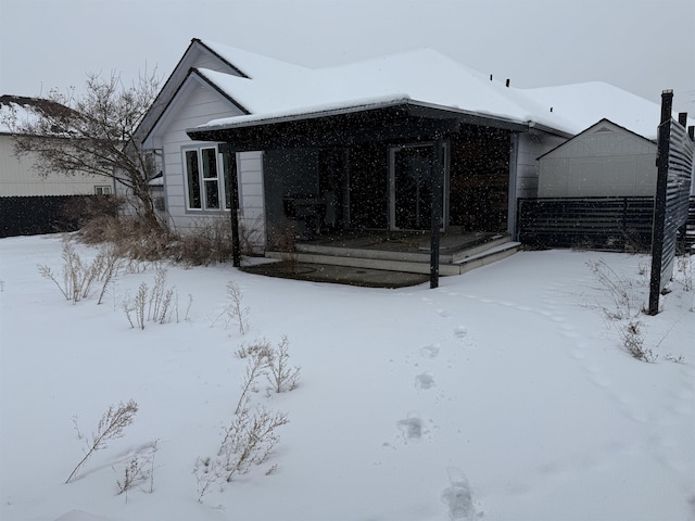 view of snow covered property