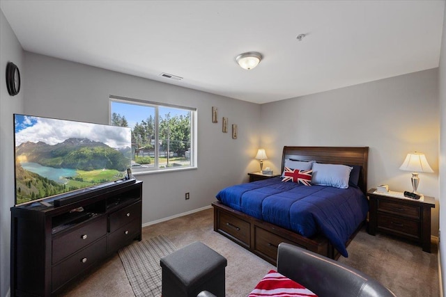 bedroom with light carpet