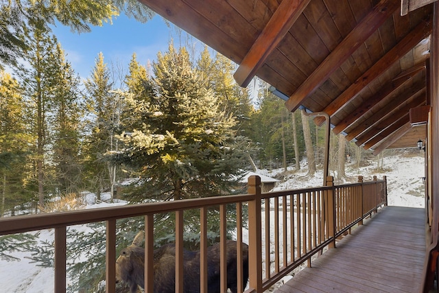 view of snow covered deck