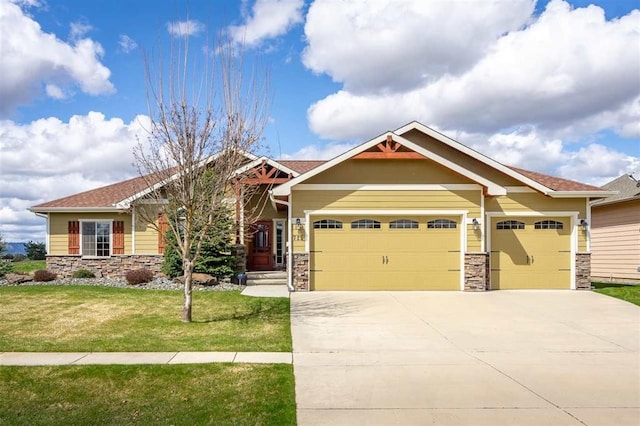 craftsman inspired home with an attached garage, stone siding, driveway, and a front yard