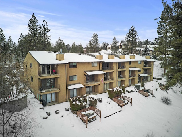 view of snow covered building