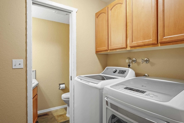 5107N Argonne Ln # 4, Spokane, WA 99212 - clothes washing area with independent washer and dryer, visible vents, laundry area, and baseboards