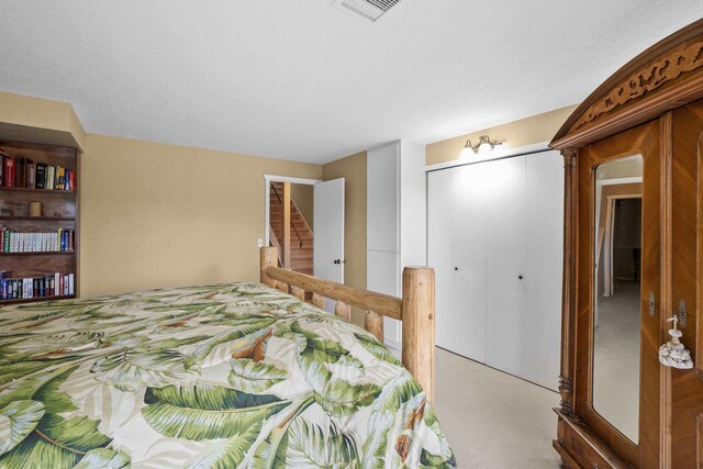 5107N Argonne Ln # 4, Spokane, WA 99212 - bedroom featuring a closet, carpet floors, a textured ceiling, and visible vents