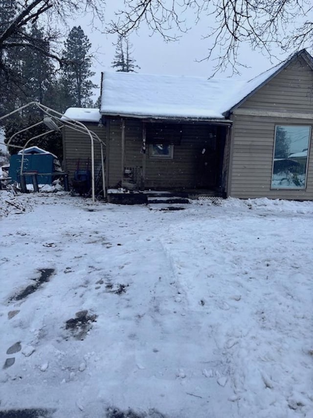 view of snow covered property