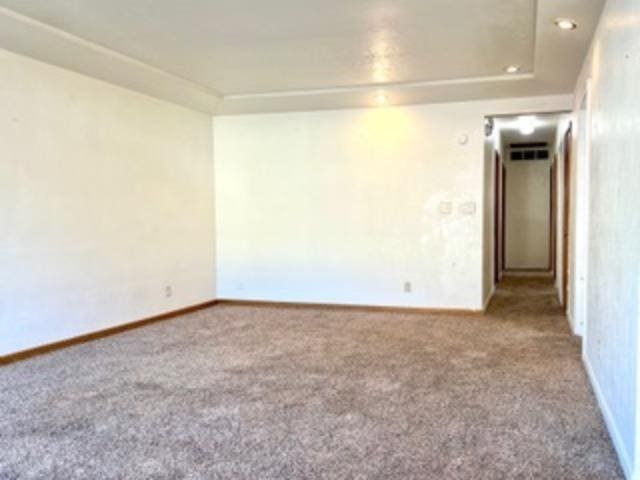 empty room featuring carpet floors