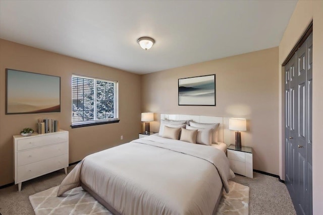 carpeted bedroom featuring a closet