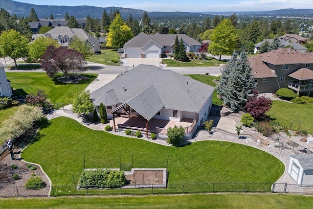 birds eye view of property featuring a mountain view