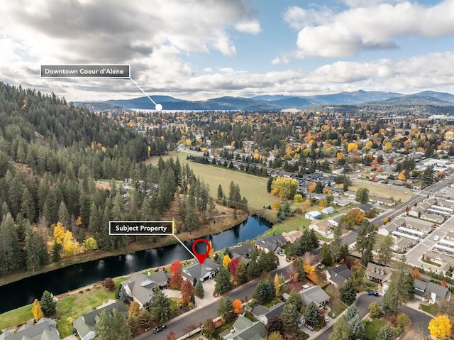 bird's eye view featuring a water and mountain view