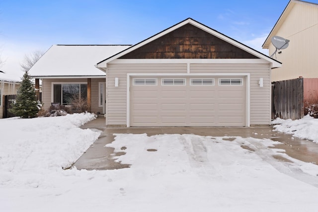 ranch-style home with fence