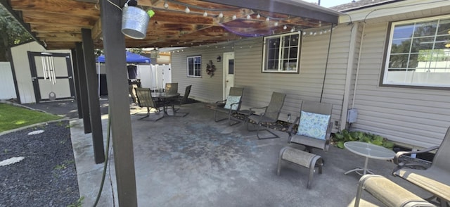 view of patio / terrace with fence