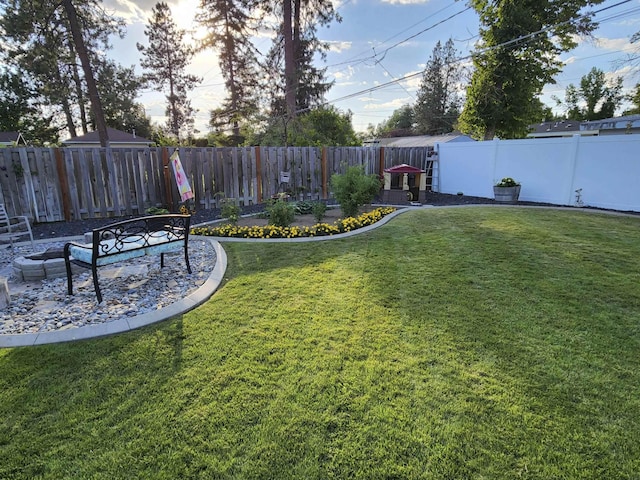 view of yard featuring a fenced backyard