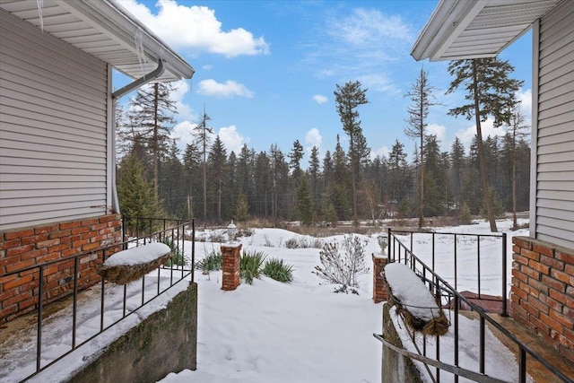 view of yard covered in snow