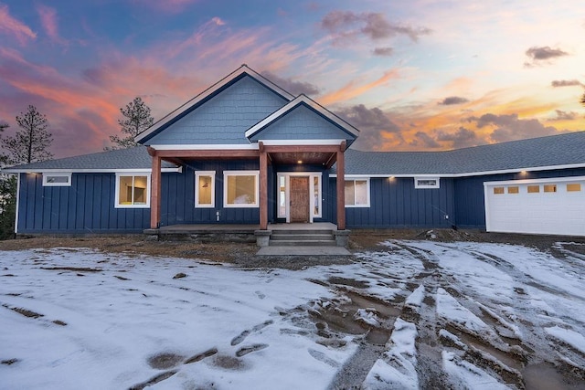 view of front of home with a garage and board and batten siding