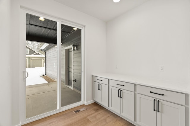 entryway with visible vents and light wood-style flooring