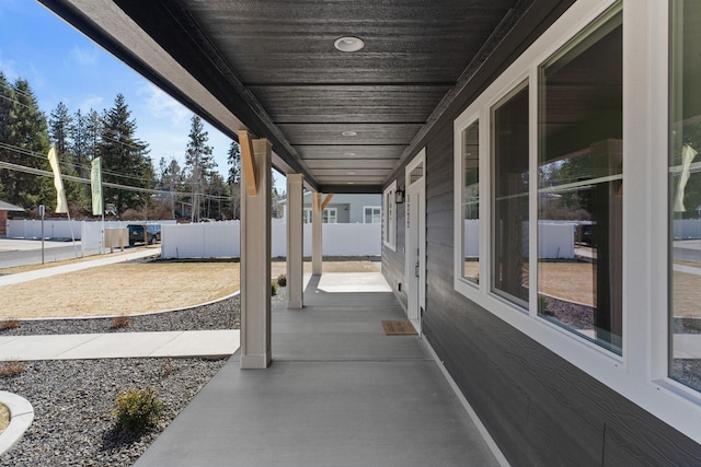 view of patio / terrace featuring fence
