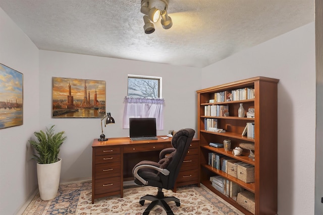 office featuring a textured ceiling