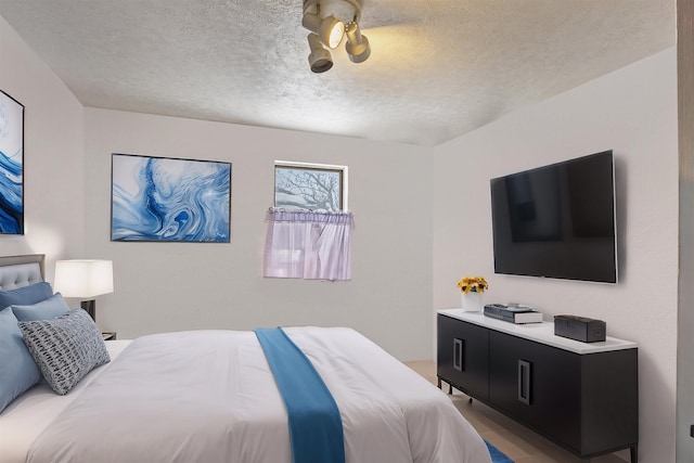 bedroom with a textured ceiling