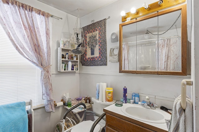 bathroom featuring vanity and a shower with curtain