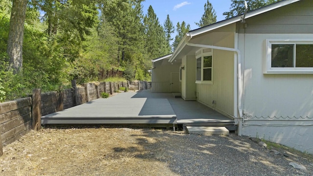 exterior space featuring a deck and a fenced backyard