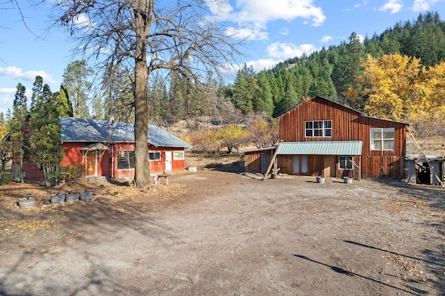 exterior space with metal roof