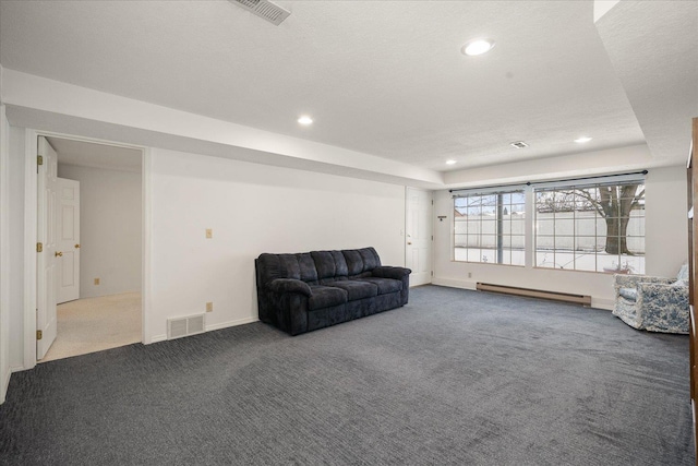 carpeted living room featuring baseboards, visible vents, baseboard heating, a textured ceiling, and recessed lighting