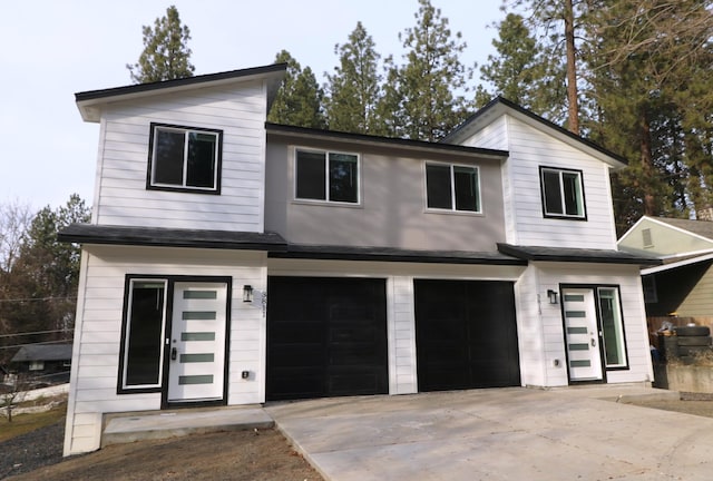 contemporary home with an attached garage